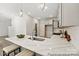 Modern kitchen island with white quartz countertop and gray cabinets at 2101 Morgan Hills Dr # 155P, Albemarle, NC 28001