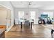 Dining area with glass-top table and hardwood floors at 2316 Woodfield Cir, Gastonia, NC 28056