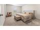 Main bedroom with a king-size bed and neutral decor at 2513 Celestial Dr, Newton, NC 28568