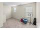 Bright bedroom featuring neutral walls and carpeted floors at 2513 Celestial Dr, Newton, NC 28568