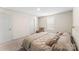 Guest bedroom with a queen-size bed and neutral decor at 2513 Celestial Dr, Newton, NC 28568