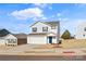 Two-story house with white siding, a two-car garage, and a blue front door at 2513 Celestial Dr, Newton, NC 28568