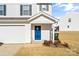 Blue front door entry with small porch and landscaping at 2513 Celestial Dr, Newton, NC 28568