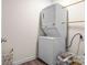 Stackable washer and dryer in a compact laundry room at 2513 Celestial Dr, Newton, NC 28568