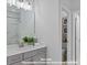 Main bath boasts a gray vanity, and a view into another room at 270 Gilead Rd, Huntersville, NC 28078