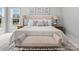 Large main bedroom showcasing a king-size bed with elegant bedding and decorative pillows at 270 Gilead Rd, Huntersville, NC 28078