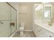 Clean bathroom with a large shower, toilet, and vanity with double sinks at 315 Valley Brook Se Ln, Concord, NC 28025