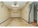 Spacious garage with extra storage shelving and flooring at 315 Valley Brook Se Ln, Concord, NC 28025