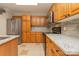 Modern kitchen with stainless steel appliances and granite countertops at 315 Valley Brook Se Ln, Concord, NC 28025