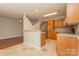 Modern kitchen with granite countertops and light wood cabinets at 315 Valley Brook Se Ln, Concord, NC 28025