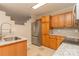 Kitchen boasts stainless steel appliances and granite countertops at 315 Valley Brook Se Ln, Concord, NC 28025