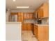 Bright kitchen, granite counters, and wood cabinets at 315 Valley Brook Se Ln, Concord, NC 28025