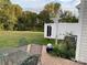 Landscaped backyard featuring a garden, a privacy fence, and outdoor seating at 3818 Carl Parmer Dr, Harrisburg, NC 28075