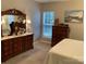 Bedroom with dresser, blinds and landscape painting on the wall at 3818 Carl Parmer Dr, Harrisburg, NC 28075