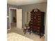 Bedroom featuring a tall dresser, chair, and an open doorway to another room at 3818 Carl Parmer Dr, Harrisburg, NC 28075