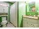 Bathroom features granite countertop and green walls at 3870 Elkwood Ct, Concord, NC 28025