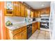 Kitchen with wood cabinets and granite countertops at 3870 Elkwood Ct, Concord, NC 28025