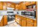 Kitchen features granite countertops and wood cabinets at 3870 Elkwood Ct, Concord, NC 28025