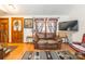 Living room with hardwood floors and a couch at 3870 Elkwood Ct, Concord, NC 28025