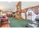 Living room with hardwood floors, green carpet and fireplace at 3870 Elkwood Ct, Concord, NC 28025