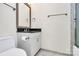 Cozy bathroom featuring a shower/tub, a mirror, and toilet at 4029 Wild Nursery Ct, Charlotte, NC 28215