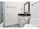 Compact bathroom featuring a single vanity with a dark countertop at 4029 Wild Nursery Ct, Charlotte, NC 28215