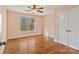 Bedroom with hardwood floors, large window, and double doors at 4070 Timber Crossing Dr, Rock Hill, SC 29730