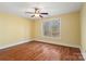 Bedroom with hardwood floors and a large window at 4070 Timber Crossing Dr, Rock Hill, SC 29730