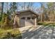 Detached brick garage with double doors and ample parking at 4070 Timber Crossing Dr, Rock Hill, SC 29730