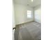 Bedroom with grey carpet and window at 412 Catawba Ave, Davidson, NC 28036