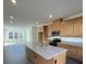 Spacious kitchen with large island and granite countertops at 412 Catawba Ave, Davidson, NC 28036