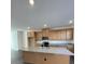 Kitchen island with granite countertop and stainless steel appliances at 412 Catawba Ave, Davidson, NC 28036