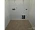 Laundry room with tile floor and hookups at 412 Catawba Ave, Davidson, NC 28036