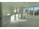 Bright and airy loft area with gray carpeting and multiple windows at 412 Catawba Ave, Davidson, NC 28036