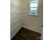 Walk-in pantry with wire shelving; great for storage at 412 Catawba Ave, Davidson, NC 28036