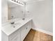 Double vanity bathroom with white cabinets at 502 Cherry St, Belmont, NC 28012