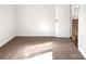 Bright bedroom with hardwood floors and neutral walls at 502 Cherry St, Belmont, NC 28012