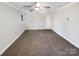 Spacious bedroom with neutral walls and carpet at 502 Cherry St, Belmont, NC 28012