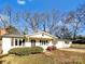 Ranch style home with a spacious yard and driveway at 502 Cherry St, Belmont, NC 28012