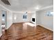 Living room featuring hardwood floors and a fireplace at 502 Cherry St, Belmont, NC 28012