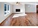 Living room with hardwood floors and a fireplace at 502 Cherry St, Belmont, NC 28012