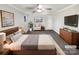 Virtually staged main bedroom with wood floors and ample space at 502 Cherry St, Belmont, NC 28012