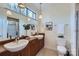 Double vanity bathroom with modern fixtures and a shower at 716 N Alexander St, Charlotte, NC 28202