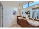 Spa-like bathroom with double sinks and large mirror at 716 N Alexander St, Charlotte, NC 28202