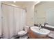 Clean bathroom with shower/tub combo and granite vanity at 716 N Alexander St, Charlotte, NC 28202