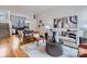 Open concept dining area with hardwood floors and modern furniture at 716 N Alexander St, Charlotte, NC 28202