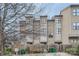 Front view of three-story townhouses with shared driveway at 716 N Alexander St, Charlotte, NC 28202