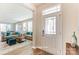 Bright entryway with view of living room and hardwood floors at 7220 Hodges Meadow Ln, Charlotte, NC 28213