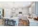 Modern kitchen with white cabinets and large kitchen island at 7220 Hodges Meadow Ln, Charlotte, NC 28213