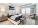 Spacious main bedroom with plush bedding and stylish decor at 7220 Hodges Meadow Ln, Charlotte, NC 28213